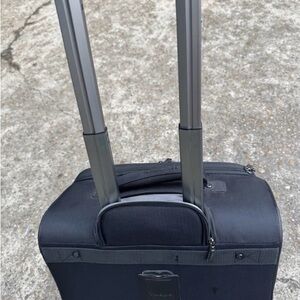 Travelpro Black Soft-Shell Rolling Under-seat Carry-On with Front Pocket